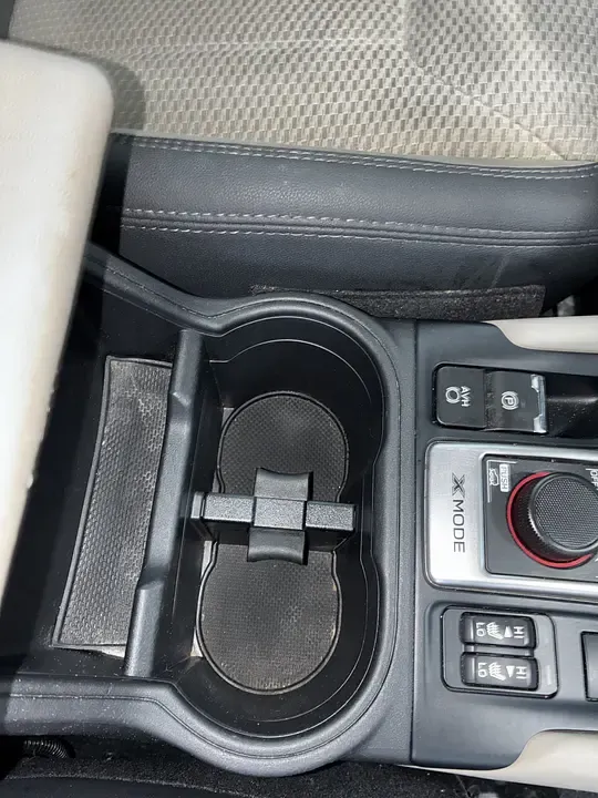 Black center console and cup holder detailed clean